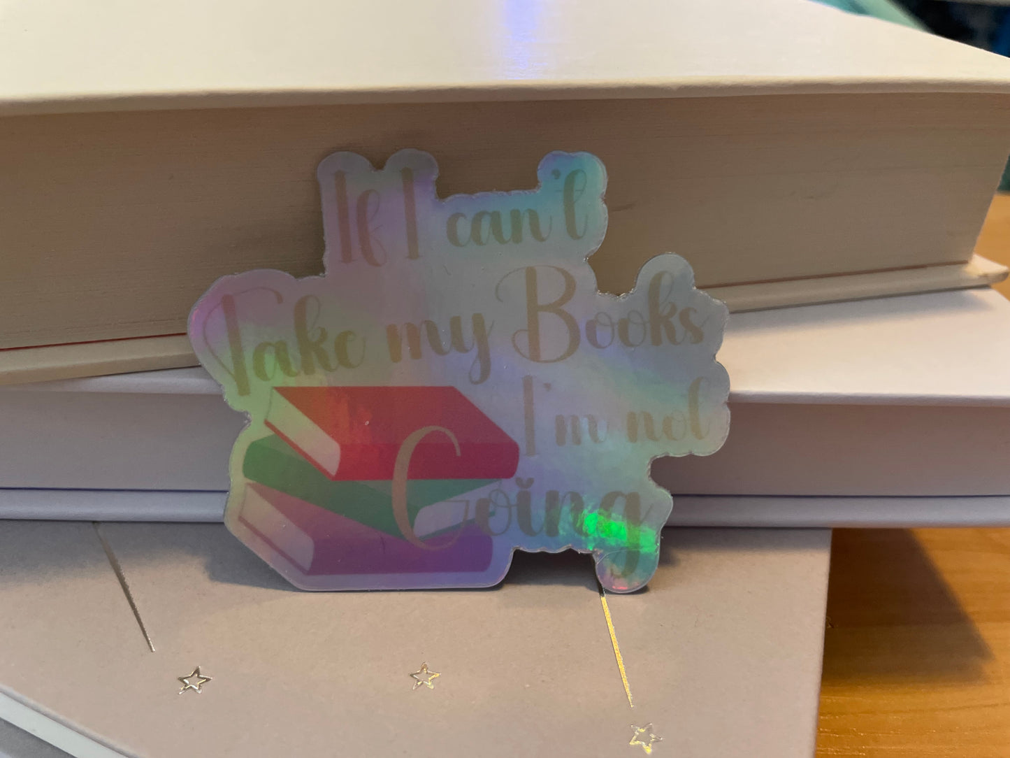 If I can’t take my books I’m not going holographic sticker